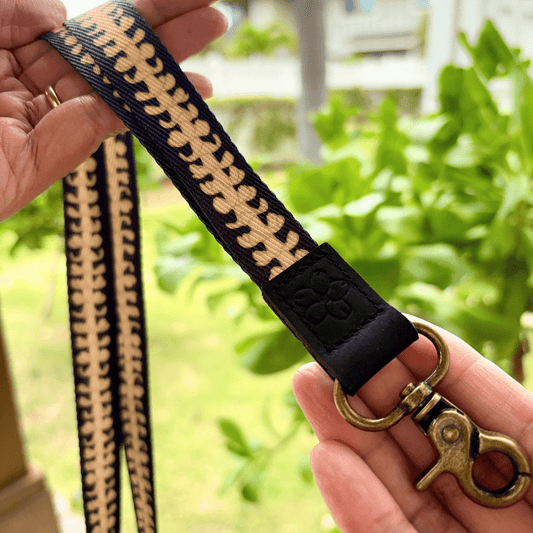 breakaway lanyards for id badges and teachers with beige puakenikeni lei by Puakenikeni Designs close up to lobster clasp