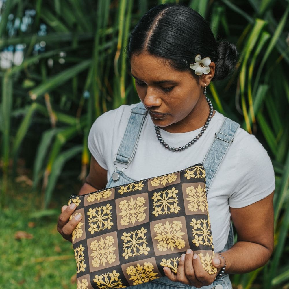 holoholo pouch - brown and yellow quilt - Puakenikeni Designs model holding