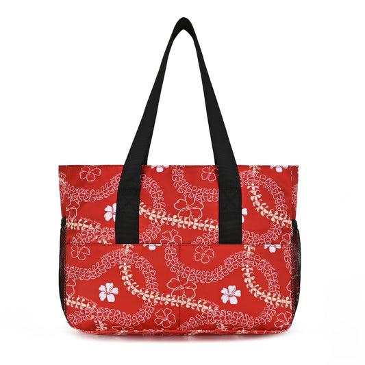 Red tote bag with white floral pattern and black handles on a white background