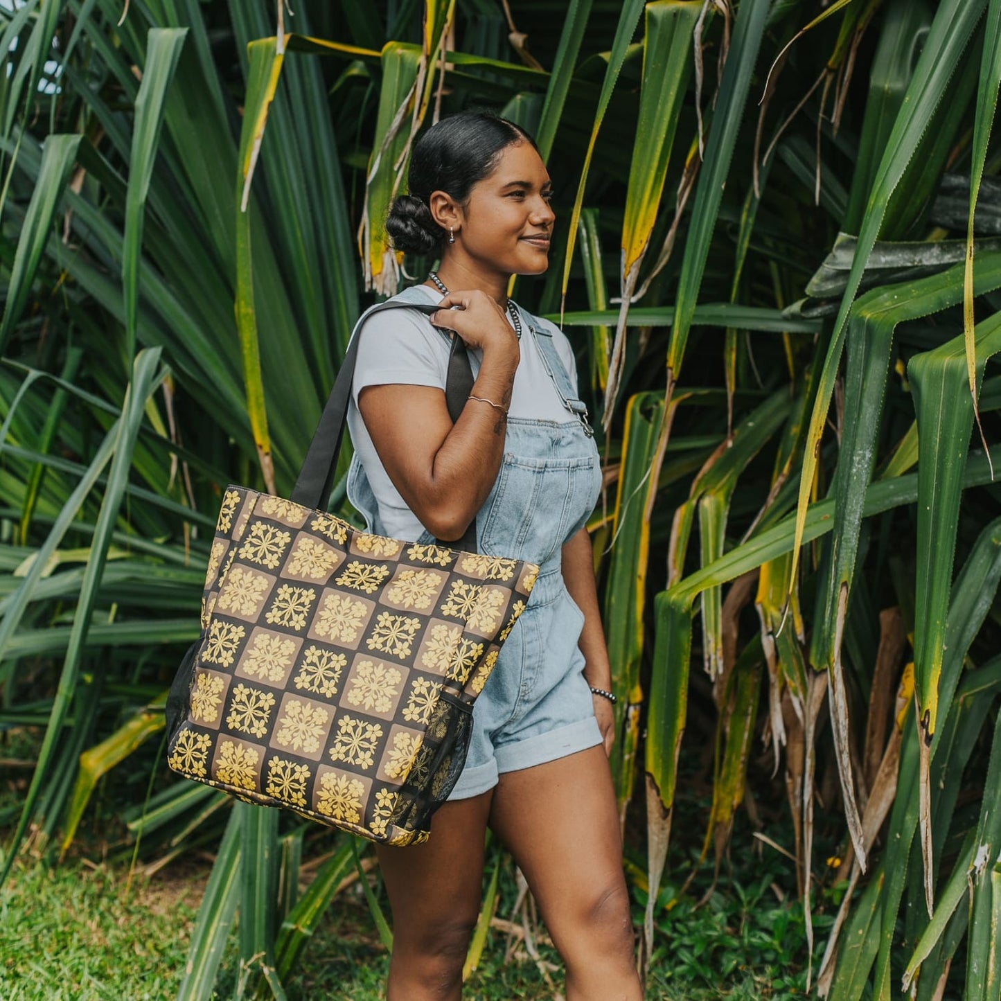 holoholo bag with pua kenikeni flowers - brown and yellow from Puakenikeni Designs on model